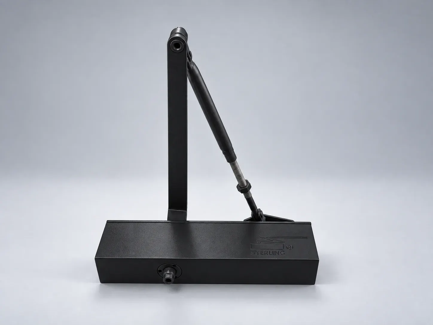 Sterling DC 2000 door closer with its lever arm raised, front view, digitally recoloured studio photograph showing the black finish