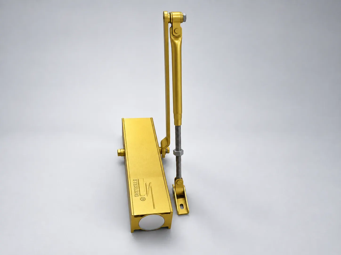 Sterling DC 2000 door closer with its lever arm raised, three quarter view from the end cap, digitally recoloured studio photograph showing the gold finish