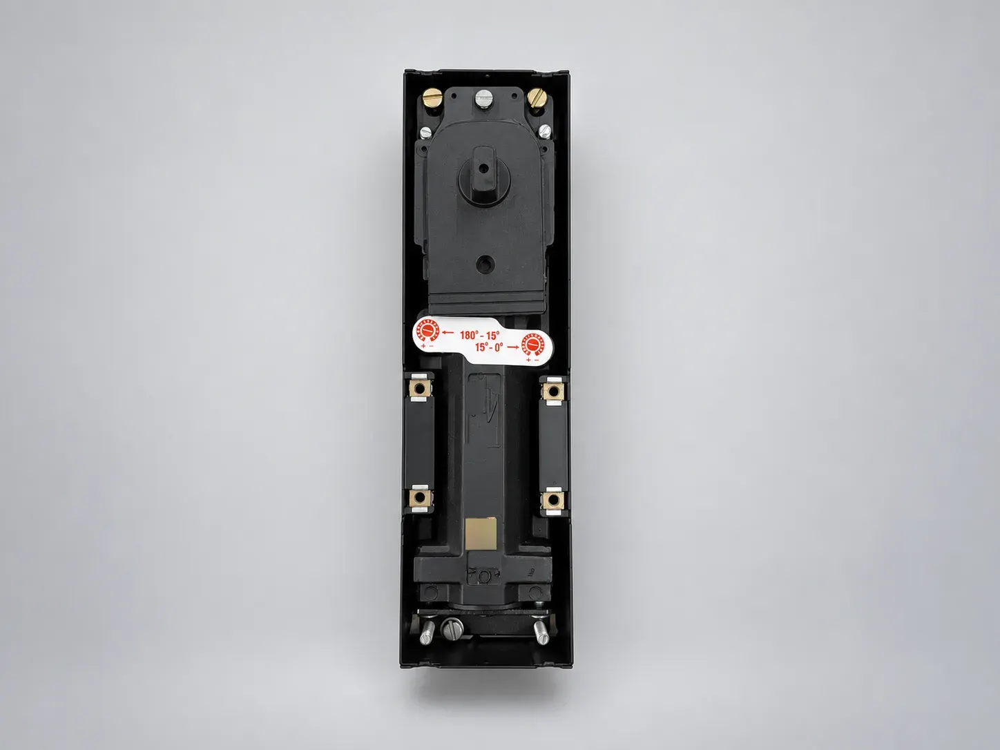 Sterling FS 3000 floor spring in its box without the cover plate, top view, studio photograph